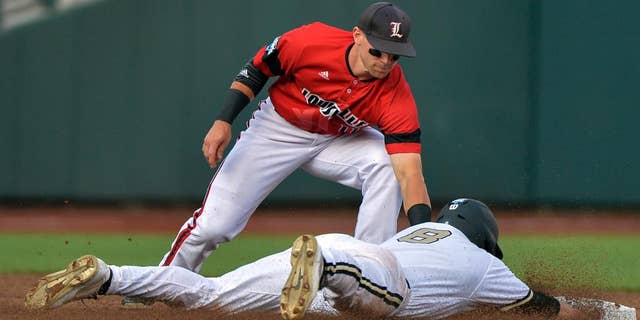 Vanderbilt's Rhett Wiseman (8) is caught stealing second base by Louisville second baseman Zach Lucas, top, in the second inning of an NCAA baseball College World Series game in Omaha, Neb., Saturday, June 14, 2014. (AP Photo/Ted Kirk)
