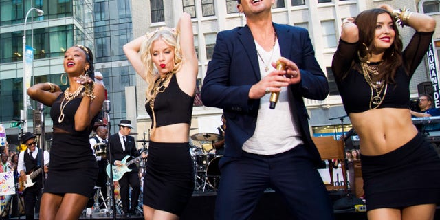 FILE - This July 30, 2013 file photo shows Robin Thicke performing on NBC's "Today" show in New York. An attorney for Thicke and collaborator Pharrell Williams filed a lawsuit Thursday, Aug. 16, 2013, in Los Angeles, asking a federal judge to determine that the pairs hit song Blurred Lines does not copy elements from two older songs by Marvin Gaye and George Clinton. (Photo by Charles Sykes/Invision/AP, File)
