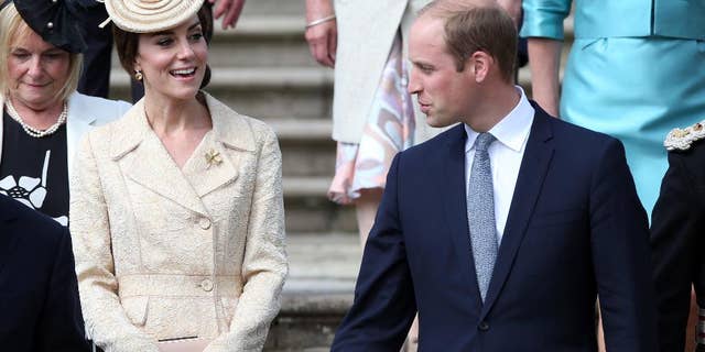 Britain's Prince William and Kate, Duchess of Cambridge attend the Secretary of State for Northern Ireland Theresa Villiers' garden party at the royal residence at Hillsborough Castle, Northern Ireland, Tuesday June 14, 2016. (Brian Lawless/PA via AP) UNITED KINGDOM OUT