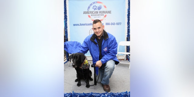 United States Marine Corporal Jeff DeYoung (ret.) and former Military Working Dog Cena N641.