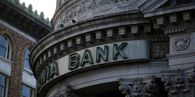 SAN FRANCISCO, CA - DECEMBER 03: A sign remains on the exterior of a shuttered Hibernia Bank on December 3, 2013 in San Francisco, California. According to the Federal Deposit Insurance Corp., the number of federally insured banking institutions in the United States has shrunk to 6,891, down from a high of over 18,000. A majority of the decline occured between 1984 and 2011 with over 10,000 banks failing, or merging with bigger institutions. (Photo by Justin Sullivan/Getty Images)