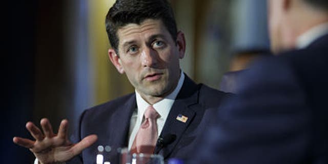 CHICAGO, IL - AUGUST 21: U.S. Rep. Paul Ryan (R-WI) answers a question while he is interviewed by former Republican presidential candidate Mitt Romney at the Union League Club of Chicago August 21, 2014 in Chicago, Illinois. The duo was on hand to promote Ryan's new book, "The Way Forward." (Photo by John Gress/Getty Images)