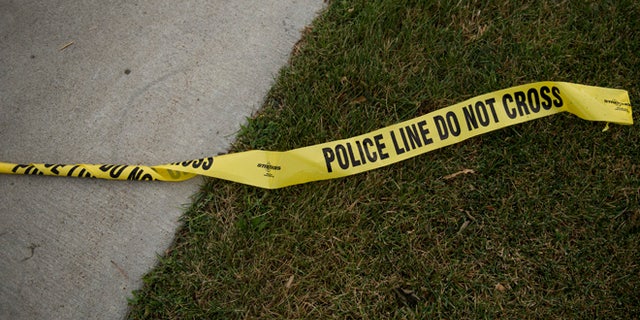 FALCON HEIGHTS, MN - JULY 07: Police tape left Larpenteur Avenue following the police shooting death of a black man on July 7, 2016 in St. Paul, Minnesota. Philando Castile was shot and killed last night, July 6, 2016, by a police officer in Falcon Heights, MN. (Photo by Stephen Maturen/Getty Images)