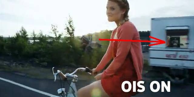 A still image from a promotional video for the Nokia 920, ostensibly shot by the phone itself, reveals the actual camera rig in a passing window.