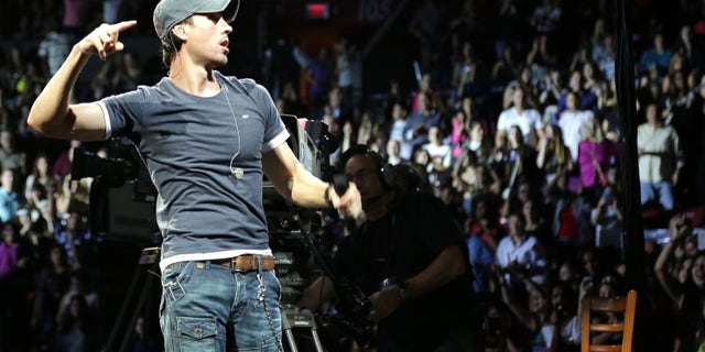 Enrique Iglesias Y100's Jingle Ball 2013 on December 20, 2013 in Miami, Florida.