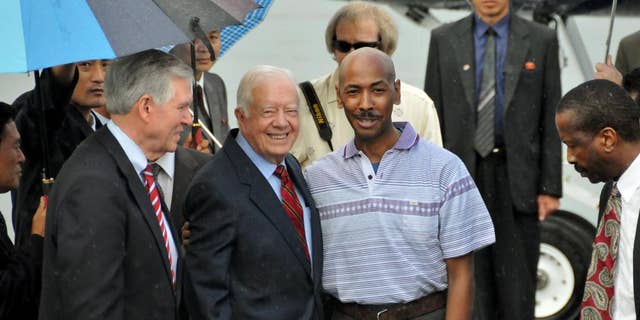 Aijalon Gomes with former President Jimmy Carter following his release from North Korea in 2010.