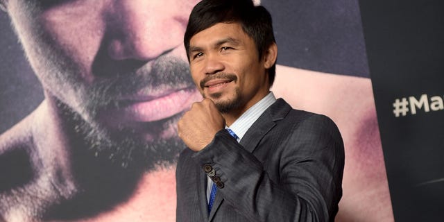HOLLYWOOD, CA - JANUARY 20: Professional boxer Manny Pacquiao attends the premiere of "Manny" at TCL Chinese Theatre on January 20, 2015 in Hollywood, California. (Photo by Jason Kempin/Getty Images)