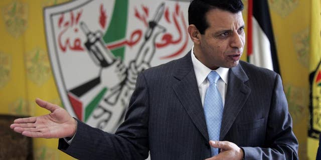 Palestinian politician Mohammed Dahlan speaks in his office in Ramallah, West Bank, Jan. 3, 2011.