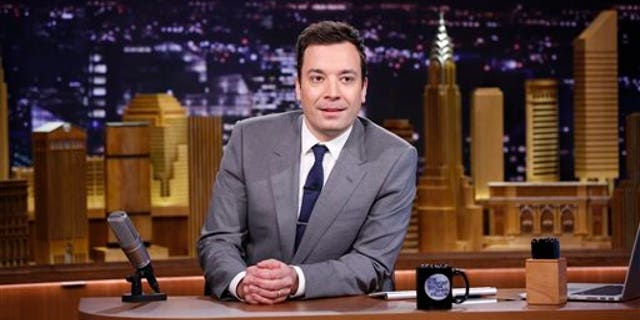 In this photo provided by NBC, Jimmy Fallon appears during his "The Tonight Show" debut on Monday, Feb. 17, 2014, in New York. Fallon departed from the network's Late Night on Feb. 7, 2014, after five years as host, and is now the host of The Tonight Show, replacing Jay Leno after 22 years. (AP Photo/NBC, Lloyd Bishop)