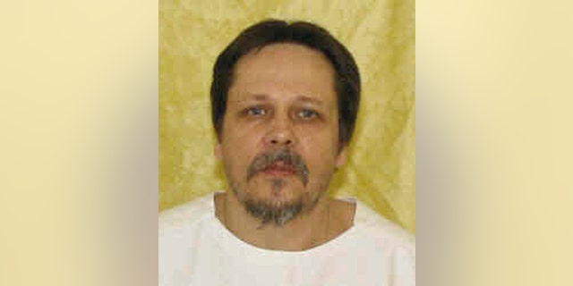 This undated file photo provided by the Ohio Department of Rehabilitation and Correction shows Dennis McGuire.