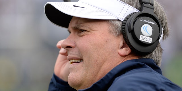 Illinois head coach Tim Beckman directs his team during an NCAA college football game against Penn State in State College, Pa., Saturday, Nov 2, 2013. Penn State defeated Illinois 24-17. (AP Photo/John Beale)