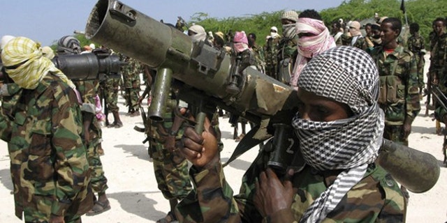 A handout released to Reuters by IntelCenter shows members of Somalia's Islamist rebel group al Shabaab in Mogadishu Jan. 1. (Reuters Photo)