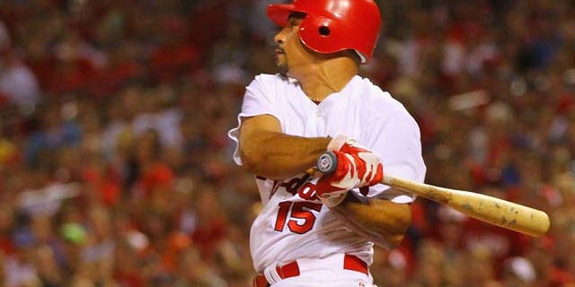 ST. LOUIS, MO - JULY 31: Newly acquired shortstop Rafael Furcal #15 of the St. Louis Cardinals pinch hits against the Chicago Cubs at Busch Stadium on July 31, 2011 in St. Louis, Missouri. The Cubs beat the Cardinals 6-3. (Photo by Dilip Vishwanat/Getty Images)