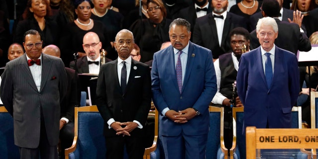 Louis Farrakhan, from left, Rev. Al Sharpton, Rev. Jesse Jackson and former President Bill Clinton attend the funeral service for Aretha Franklin at Greater Grace Temple, Friday, Aug. 31, 2018, in Detroit. Franklin died Aug. 16, 2018 of pancreatic cancer at the age of 76. (AP Photo/Paul Sancya)