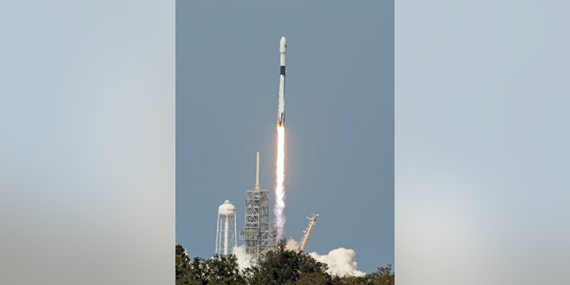 An upgraded version of the SpaceX Falcon 9 Block 5 rocket lifts off Friday, May 11, 2018 from launch pad 39A at the Kennedy Space Center carrying Bangladesh's first communications satellite. The $250 million satellite, the nation's first, is designed to improve television, telephone, data, Internet and emergency communications for Bangladesh. (Red Huber /Orlando Sentinel via AP)
