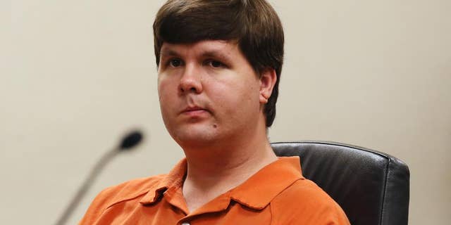 FILE - In a Thursday, July 3, 2014 file photo, Justin Ross Harris, the father of a toddler who died after police say he was left in a hot car for about seven hours, weeps as he sits at his bond hearing in Cobb County Magistrate Court, in Marietta, Ga. On Thursday,, Sept. 4, 2014, a Cobb County grand jury indicted Harris on multiple charges, including malice murder, felony murder and cruelty to children. The malice murder charge indicates that prosecutors believe that Harris intentionally left his son Cooper in the hot car to die. (AP Photo/Marietta Daily Journal, Kelly J. Huff, Pool, File)