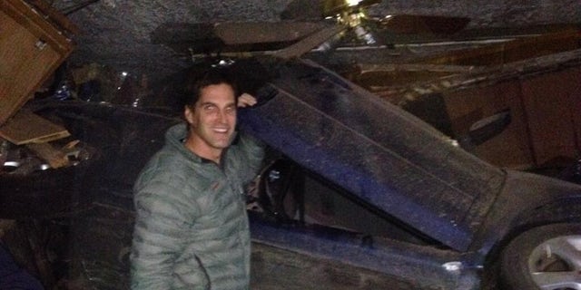 Nov. 28, 2013: Josh Romney, son of former presidential candidate Mitt Romney, tweeted this photo of himself at an accident scene in which he helped a family of four after they crashed into a house in Holladay, Utah. No one was hurt in the accident.