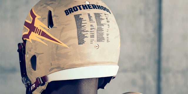 On the back of the helmet lists all player and coaches on the ASU squad who were or are currently serving in the military.