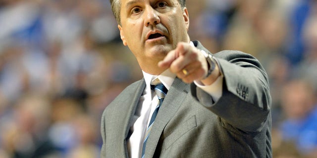 Kentucky head coach John Calipari directs his team during the second half of an NCAA college basketball game Tuesday Dec. 10, 2013, in Lexington, Ky. Kentucky defeated Boise State 70-55. (AP Photo/Timothy D. Easley)