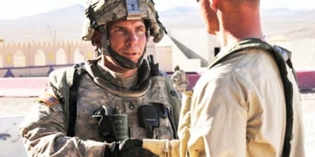 Aug. 23, 2011: Staff Sgt. Robert Bales is seen in this image from a military newsletter participating in a training exercise meant to simulate contact with local Afghan civilians.