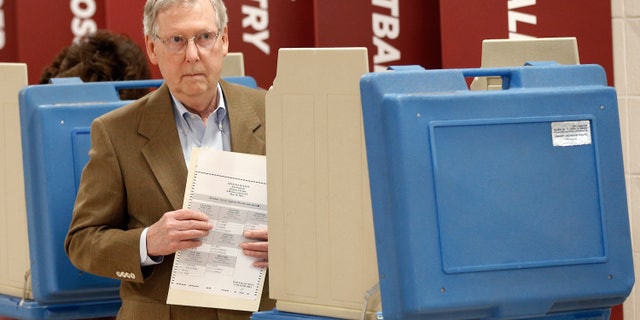 Sen. Mitch McConnell votes in the state Republican primary on May 20, 2014 in Louisville, Kentucky.