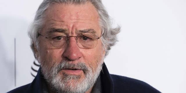 FILE - In a Wednesday, April 19, 2017 file photo, Robert De Niro attends the world premiere of "Clive Davis: The Soundtrack of Our Lives" at Radio City Music Hall, during the 2017 Tribeca Film Festival, in New York. Brown University announced Friday, Friday, April 21, 2017, that De Niro is among six people scheduled to receive honorary degrees at Brown University’s commencement exercises during the school’s May 28 ceremonies. De Niro will receive a doctor of fine arts degree. (Photo by Charles Sykes/Invision/AP, File)