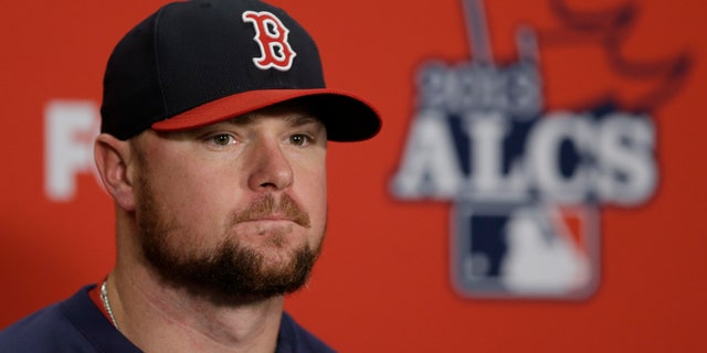 Boston Red Sox's Jon Lester listens to a question during a news conference before Game 4 of the American League baseball championship series against the Detroit Tigers Wednesday, Oct. 16, 2013, in Detroit. Lester is expected to be the Game 5 starter for Boston. (AP Photo/Carlos Osorio)