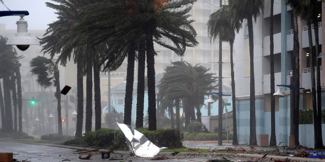 Debris flies through the air as the eye of Hurricane Matthew nears Daytona Beach.