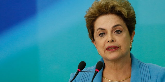 BRASILIA, BRAZIL - APRIL 18: President of Brazil Dilma Rousseff speaks at a press conference April 18, 2016 in Brasilia, Brazil. The lower house of Congress voted for a motion to impeach Rousseff and the process now moves to the Senate for a vote. (Photo by Igo Estrela/Getty Images)