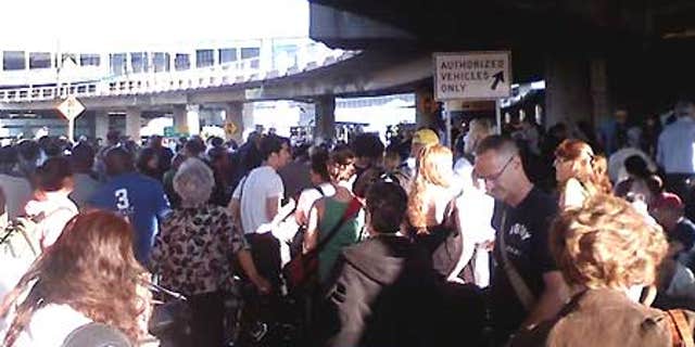 Aug. 1: The main terminal in New York City's LaGuardia Airport was evacuated Saturday morning after a man carrying a fake bomb in his bag was stopped.