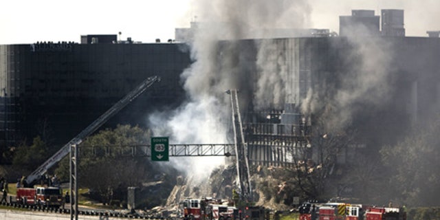 Feb. 18: Smoke billows from a 7 story building after a small plane crashed into it in Austin.