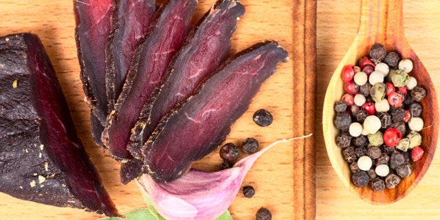 Dried beef meat still life. Beer set
