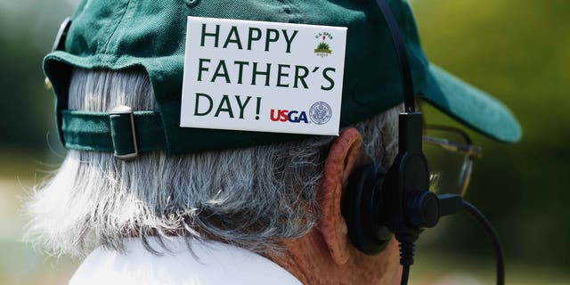 ARDMORE, PA - JUNE 16: A man wears a badge on his hat that says "Happy Father's Day" during the final round of the 113th U.S. Open at Merion Golf Club on June 16, 2013 in Ardmore, Pennsylvania. (Photo by Scott Halleran/Getty Images)