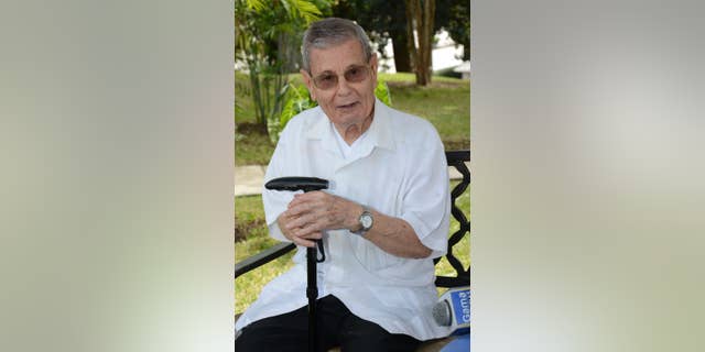 In this July 2, 2015 photo released by El Diario in Ecuador, Spanish Priest Francisco Cortes Garcia, affectionately known as "Father Paquito," talks to reporters at the Javier school where he's the director and teaches, in Guayaquil, Ecuador. Paquito will meet with Pope Francis, a friend since the 1980's, during the pope's upcoming visit to Guayquil. (El Diario/Darwin Romero via AP)