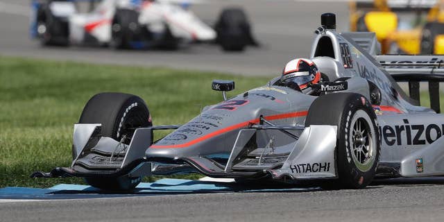 Juan Pablo Montoya, of Colombia, steers his car during practice session for the Grand Prix of Indianapolis auto race at Indianapolis Motor Speedway in Indianapolis, Thursday, May 12, 2016. (AP Photo/Darron Cummings)