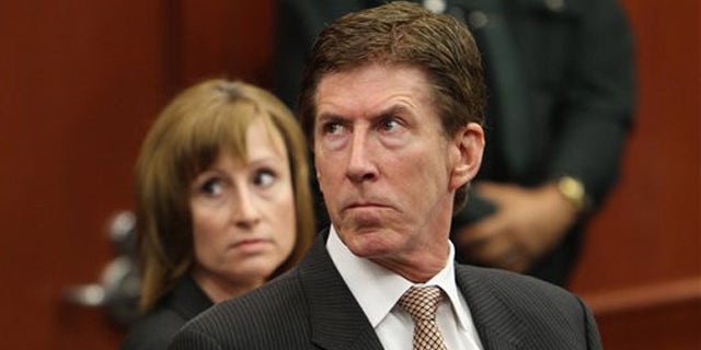 April 27, 2012: Attorney Mark O'Mara, right, and associate Lorna Truett appear in court on behalf of their client George Zimmerman during a hearing in his trial in Sanford, Fla.
