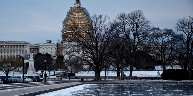 Sub-freezing temperatures continue in on Capitol Hill in Washington early Friday morning, Jan. 9, 2015. With the end of the first week of the GOP controlled 114th Congress, House Republicans are on track to easily pass legislation to authorize the construction of the Keystone XL oil pipeline, moving the GOP-led Congress closer to a clash with President Barack Obama. (AP Photo/J. Scott Applewhite)