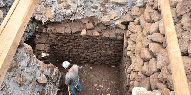 An incense burner and ceramic shards were also located in the remains.
