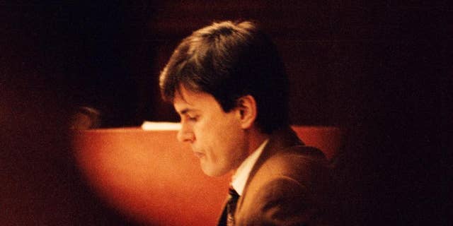 FILE - This is a Feb. 2, 1995 file photo of John Ausonius during a trial in the district court in Stockholm. Germany has asked Sweden to extradite John Ausonius one of its most notorious prisoners to stand trial in the murder of a Jewish woman in Frankfurt in 1992. Dubbed “Laserman” for the gunsight he used, Ausonius is serving a life sentence in Sweden for a series of shootings of immigrants in the 1990s. He was convicted of one murder and nine attempted murders. (Tobias Rostlund/TT, File Via AP)