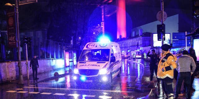 Ambulances rushing away from the scene of an attack in Istanbul, early Sunday, Jan. 1, 2017. Private NTV television said more than one assailant may have been involved in the attack. The attacker or attackers are believed to have entered the nightclub in Istanbul's Ortakoy district disguised as Santa Claus, the station reported. (AP Photo)
