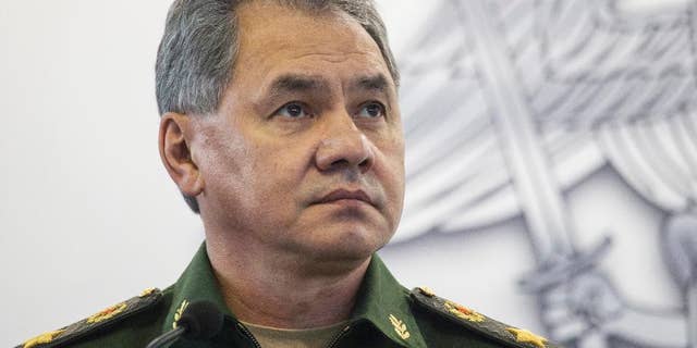 FILE In this file photo taken on Monday, Oct. 5, 2015, Russian Defence Minister Sergei Shoigu attends an opening ceremony during an Innovation exhibition of the Russian Defense Ministry in Kubinka outside Moscow, Russia. Shoigu said Friday, March 25, 2016 that NATO's moves to build up its military forces near Russia's borders has caused Moscow's concern and required a response. (AP Photo/Pavel Golovkin, File)