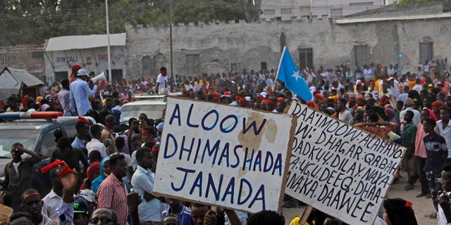 Somali nationals protest al-Shabaab extremists following last month's truck bomb that killed more than 350 people.
