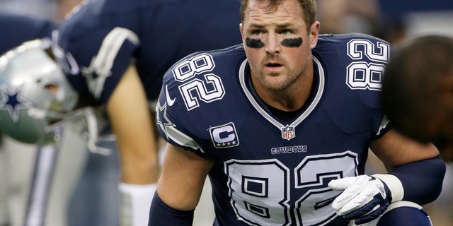 FILE - In this Nov. 28, 2013 file photo, Dallas Cowboys tight end Jason Witten (82) before an NFL football game against the Oakland Raiders, in Arlington, Texas. Witten's memorable "same old story" sound bite will live until the Dallas Cowboys change the ending and make the playoffs, if they ever do. (AP Photo/Tim Sharp, File)