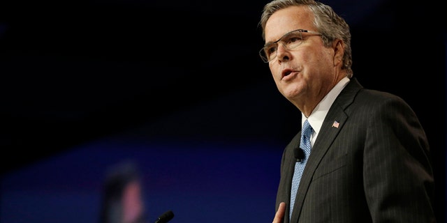 Former Florida Gov. Jeb Bush speaks at the National Automobile Dealers Association convention in San Francisco, Friday, Jan. 23, 2015. (AP Photo/Jeff Chiu)