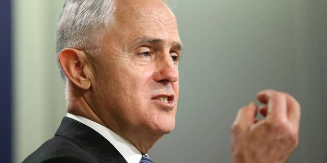In this Aug. 10, 2016 photo, Australian Prime Minister Malcolm Turnbull addresses the media from the government offices in Sydney. Turnbull said Tuesday, April 18, 2017, that the country will scrap a temporary visa for skilled foreign workers, arguing that Australians must be given priority for Australian jobs. (AP Photo/Rick Rycroft)