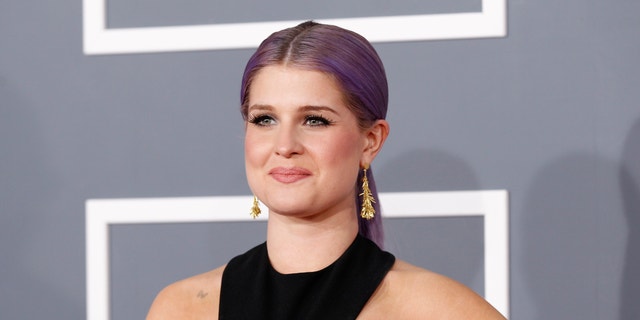 Television personality Kelly Osbourne arrives at the 55th annual Grammy Awards in Los Angeles, California February 10, 2013.