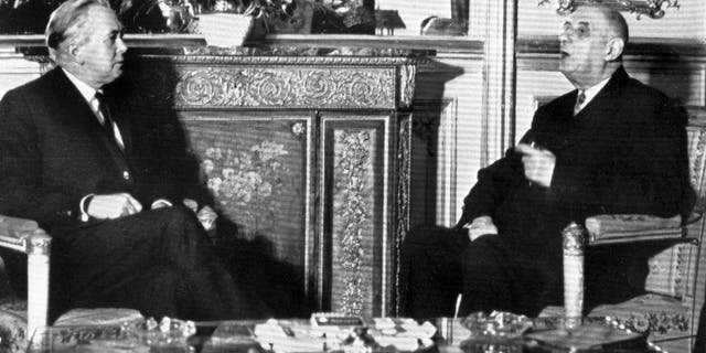 FILE - In this Jan. 24, 1967 file photo, British Prime Minister Harold Wison, left, sits in a room of the the Elysee Palace in Paris, France with French President Charles de Gaulle. Later that year, de Gaulle would veto Britain's efforts to join the-then European Economic Community. It was only after de Gaulle's death that Britain eventually joined the EEC in 1973. Britain holds a vote on June 23, 2016 to decide whether to stay in the European Union. (AP Photo, File)