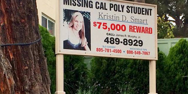 A sign outside the James R. Murphy, Jr. law office in Arroyo Grande, Calif., offers a reward for information in the 1996 disappearance of Kristin Smart, Wednesday, Sept. 7, 2016.