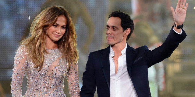 LAS VEGAS, NV - MAY 26: Singer/actress Jennifer Lopez (L) and singer Marc Anthony appear during the finale of the Q'Viva! The Chosen Live show at the Mandalay Bay Events Center on May 26, 2012 in Las Vegas, Nevada. (Photo by Ethan Miller/Getty Images)