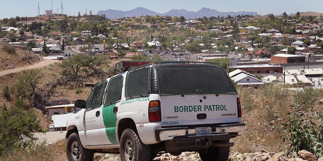 NOGALES, AZ - JUNE 01:  A Border Patrol agent patrols the border June 1, 2010 in Nogales, Arizona. During the 2009 fiscal year 540,865 undocumented immigrants were apprehended entering the United States illegally along the Mexican border, 241,000 of those were captured along this 262 mile stretch of the border known as the Tucson Sector.  (Photo by Scott Olson/Getty Images)